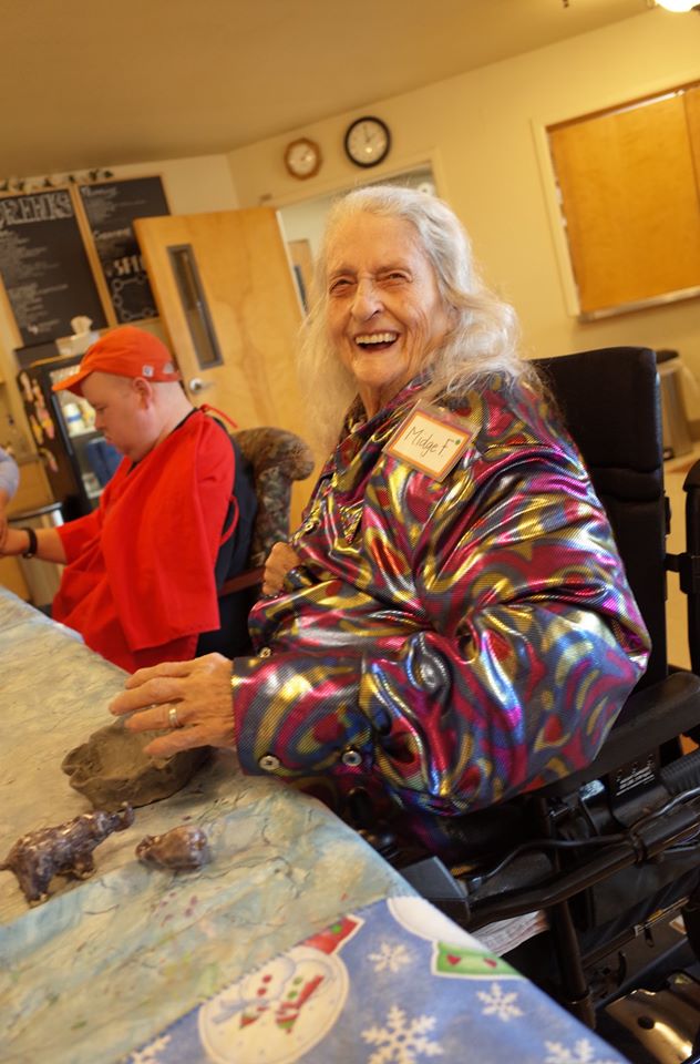 A Grace Center participant in a ceramics class