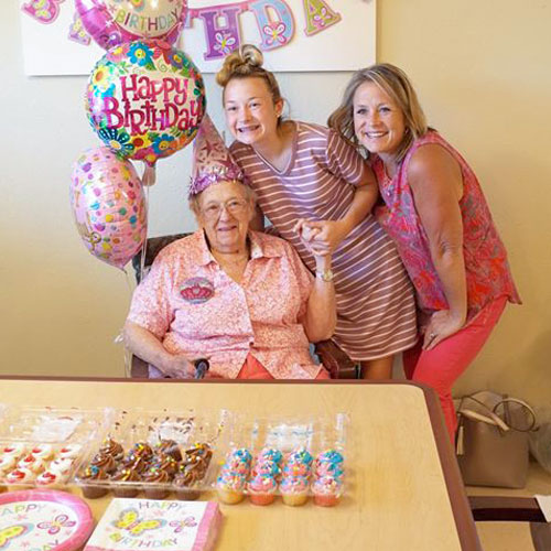 Dorothy celebrating her 90th birthday with her family at Grace Center